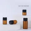 4000 stks / partij amberkleurige glazen etherische olieflessen met zwarte dop cosmetische verpakkingen reisflessen