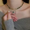Collier enveloppé de cuir de perles numéro 5 cloutés de diamants, tempérament de luxe léger doux et haut de gamme, collier de clavicule de pull