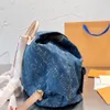 Designer quente mochila designer de luxo mochila feminina mochila de viagem desenhar corda para abrir e fechar lona revestida bolsa de ombro mochila