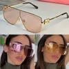 Fashion designer brand Miu Logo sunglasses with oversized geometric metal frame for men women modern fashion style sunglasses with box SMU51zs