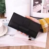 Carteras Cartera para mujer Cartera larga para mujer con solapa triple versión coreana de pequeños estudiantes frescos que cambian de broca de cuero con hebilla multifuncional