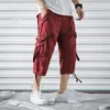 Pantaloni cargo da uomo Pantaloni corti casual Abbigliamento da lavoro da uomo Pantaloni larghi in felpa alla moda Tasche multiple Sport da spiaggia in cotone Pantaloni corti