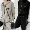 Kvinnors träningsdräkter Kvinnor Casual Tracksuits Designer Hooded Sportswear Tracksuit Soft Cotton Fashion Clothes Långärmad jacka med byxor Två styckesuppsättningar SML