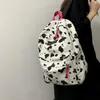 Schulbeutel Frauen Leinwand Zebra Kuhmuster Druck Rucksack Preppy Damen große Handtaschen wasserdichte Campus Reise Rucksack