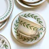 Set di lusso leggero personalizzato per tazza da tè e caffè e piatto in ceramica con motivo a foglie, stile europeo coreano 200 ml 240301