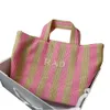 Designer Beach Bag Högkvalitativ handväska Kvinnor Bag Ny modetrend Raffia Summer Vacation Bag Casual Versatile Woven Tote Bag D0034
