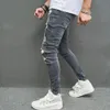 Rippade magra män blyerts jeans byxor stilfulla hiphophoppfläckbläck tryckta hål nödställda stretch denim byxor för mens 240227