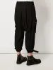 Pantaloni da uomo nuovo stile urbano giovanile nero sfilata di moda vincolante pantaloni casual dal design piccolo abbigliamento abbigliamento da cantante di grandi dimensioni