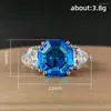 Anelli a grappolo Huitan Personalità geometrica Blu Zirconia cubica per le donne Anniversario di matrimonio Temperamento per feste Gioielli da donna eleganti