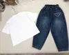 Mode-Tracksuits Baby Kurzarm zwei Stück Set Kids Designer Kleidung Größe 100-160 cm Geometrischer Druckkinder T-Shirt und Jeans 24 Feb220