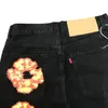 Jeans masculinos designer de alta rua flor denim grinalda preto lavado jeans retos calças soltas empilhadas jeansbiker caminhoneiro jaqueta moda vintage remendo de couro outono