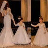 Robes de fille fleur pour les mariages fête princesse dentelle à manches longues dos nu saint nœud ceinture robes de première Communion robe de concours