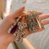 Porte-clés mignon strass ours femmes cristal porte-clés bracelet en cuir pendentif à breloques 240303