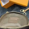 Keychains 21SS Coin Purse Keychains Rings BOX Luxury Leather Pendant Chains Buckle Letter Quality Women 240303