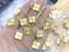 2024 Jewelry Designer Brand Vanl Cleefl Arpelspendant Clover Ten Flower Laser Necklace with Double Sided v Gold Thick Plating 18k Natural White Fritillaria Live