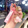 Keychains Cute Cartoon Cherry Blossom Drift Bottle Keychain Creative Trend Dumb Girl Heart Key Ring Charm Students SchoolbagCharmWholesale