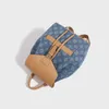 Den nya denim Floral ryggsäcken är en snygg mini -ryggsäck 22*27*13