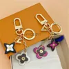 Keychains Luxury Blooming Flowers Keychains Designer Ring Woman 2 Styles Portachiavi Letter Fashion Petal Pendant 240303