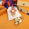 Keychains Lanyards Diamond Luxury Designer Sun-Flower Doll Carabiner Keychains Keys Buckle Quality 240303