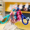 Schlüsselanhänger Designer Schlüsselanhänger Lanyards Bär Schultasche Paar Autoschlüssel schillernde Flüssigkeit süßer Schlüssel kreative personalisierte Accessoires Männer Frauen Geschenktüte 240303