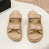 High quality designer sandals cowhide flat sandals Luxury women's buckle embellished sandals are backed by empty open-toed flip-flops