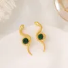 Boucles d'oreilles pendantes en forme de serpent pour femmes, tendance Punk, couleur or, motif Animal, clous d'oreille avec strass vert, accessoires, cadeau