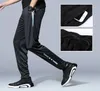 Män som kör byxor Athletic Football Sports Pants Soccer Pant Training Loose Sport Legging Gym Byxor Zip Pocket2341847