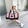 Sacs Duffel Sac de fitness unisexe tenu dans la main pour les voyages d'affaires avec compartiment à chaussures indépendant de grande capacité bagages à courte distance