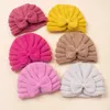 ヘアアクセサリーベビーガールのための結び付けられた帽子beanie bow headband幼虫生まれ冬の帽子温かいボンネットキャップマザーキッズ