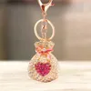 Porte-clés mignon strass cristal rose porte-bonheur sac argent porte-clés Fortune porte-clés porte-anneau pendentif porte-clés