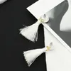 Boucles d'oreilles pendantes en plastique noir et blanc avec cordes en coton pour femme