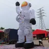 wholesale Activités de plein air 8mH (26ft) Avec ventilateur annonçant un ballon à air gonflable géant de dessin animé Spaceman avec lumière LED à vendre