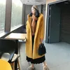 Giacca da donna in pelliccia sintetica spessa Colorblock Autunno Inverno Maxi cappotto con cappuccio Lungo caldo cintura di lusso Parka Bontjas Capispalla peloso