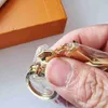 Key Rings New alloy gold design astronaut keychains accessories designer keyring solid metal car key ring gift box packaging 240303