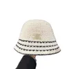 Bucket hat DESIGNERS women Spring and Autumn Hollow out Woven straw hat outdoors sunhat