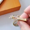 Key Rings New alloy gold design astronaut keychains accessories designer keyring solid metal car key ring gift box packaging 240303