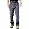 Pantaloni tattici da uomo elasticità con tasche multiple pantaloni tattici militari da uomo slim outdoor impermeabile Army Cargo 240226