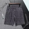 Verão nova moda masculina designer shorts de secagem rápida roupa de banho impressa calças de praia shorts de natação masculino marca luxo solto moda casual calças 06