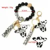 Key Rings Keychains Lanyards Sile Cursive Cow Bead Bracelet Wood Disk Bracelet Cow Tassel Ox Head Wrist Key Ring Accessory FY3450 tt0331 240303