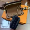 Keychains Fashion Buckle Designer Handmade Leather Luxury Keychains Man Woman Purse Pendant Coins 240303