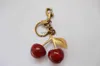 Keychains Cherry Red Chapstick Wrap Lipstick Cover Team Lipbalm Mysigt/väska delar Mode 240303