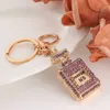 Porte-clés Design porte-clés parfum porte-clés femmes créatif cristal strass métal voiture porte-clés sac cadeau bon 240303