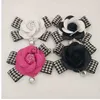 Key Rings Famous Keyring Black White Leather Camellia Flower Keychain Women Flower Key Chains llaveros flore Bag Charms 240303