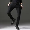 Jeans da uomo primavera e autunno versione coreana Jeans dritti da uomo con gamba elastica per giovani in cotone nero slim fit