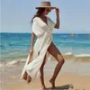 2024 Пляжное платье из хлопка с открытой спиной и дизайнерским пляжным платьем для отдыха