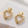 Boucles d'oreilles pendantes, sac en maille, personnalité européenne et américaine, creux, amour INS Wind, boucles d'oreilles en forme de cœur, cadeau