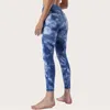 Nuevos pantalones de yoga sin hilo incómodo para los pantalones ajustados de cintura alta de fitness teñido anudado para mujer