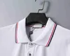 T-shirts Mens Men's Polo Shirt Designer Man Fashion T Shirts Casual Golf Polos Chest Badge Top Black and White Solid Colors Storlek M-3XL 240304