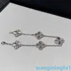 2024 Marque de créateurs de bijoux Vanl Cleefl Arpels925 Sterling Silver Laser Trèfle à quatre feuilles Bracelet à cinq fleurs plaqué avec précision CNC en or blanc 18 carats