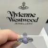 Bague de créateur VivieneWestwoods Empress Dowager Xis Perles de verre rotatives Saturn de haute qualité avec micro-ensemble de bague en zircon Petit et haut de gamme Élégant et élégant R